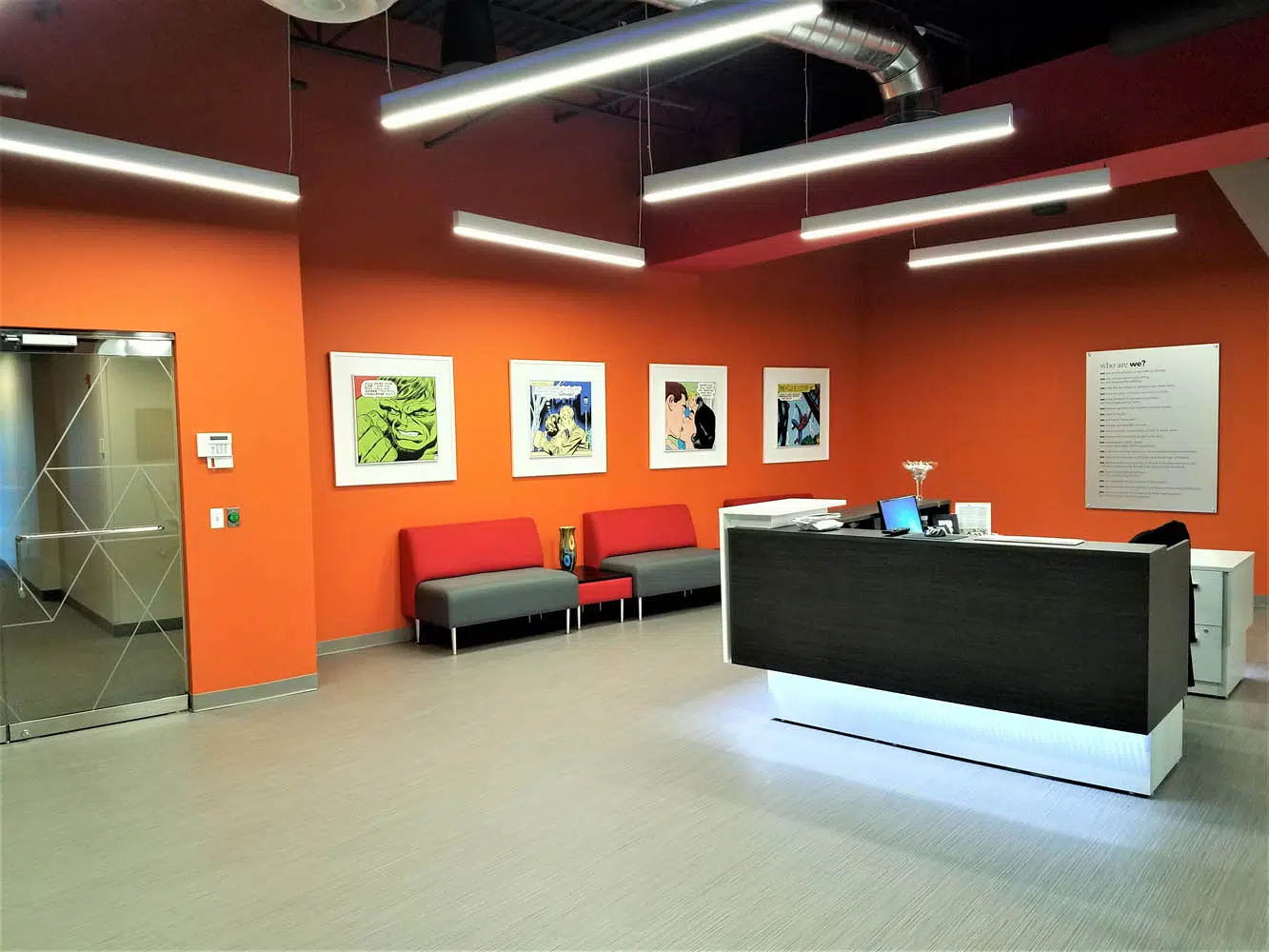 Modern office entryway that emphasizes brand colors and character