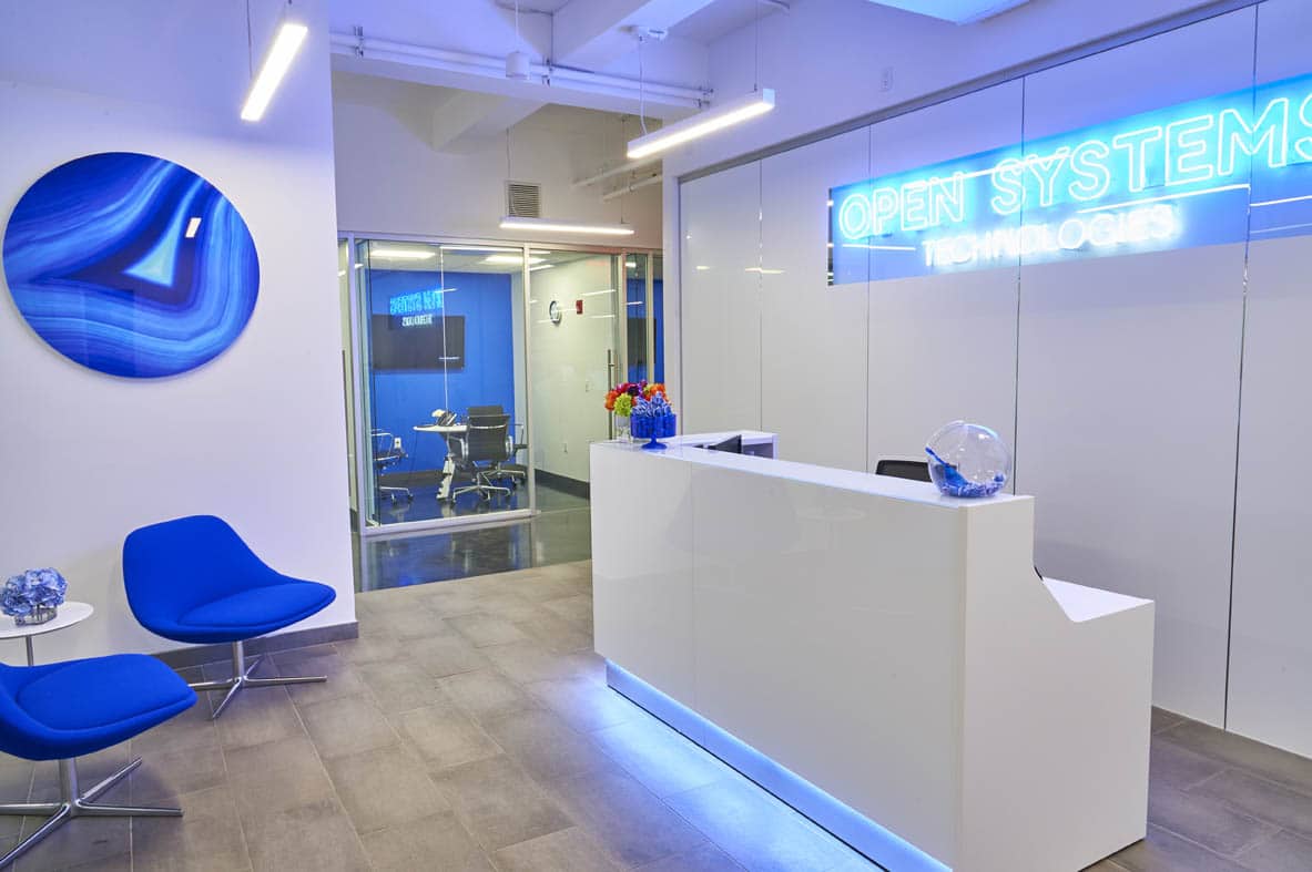 Open Systems Technologies Inc. reception area with neon lighting