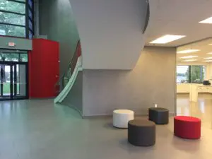 office foyer area with colored seating